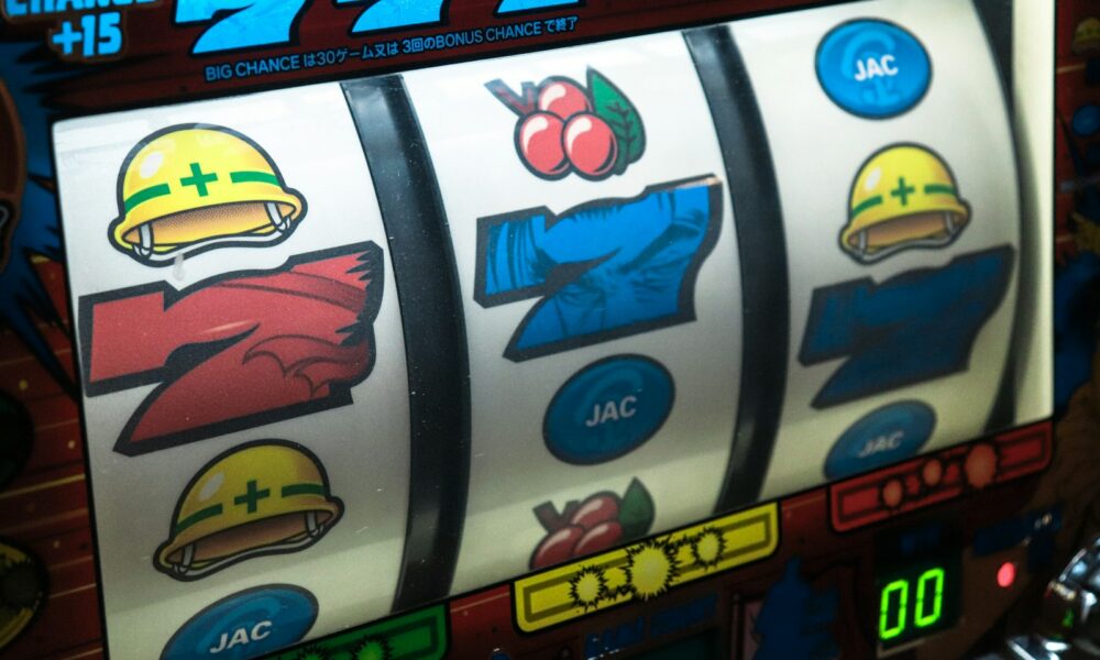 slot machine displaying three seven